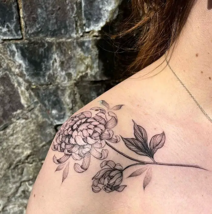 Yellow flower tattoo on the shoulder and sleeve  Tattoogridnet