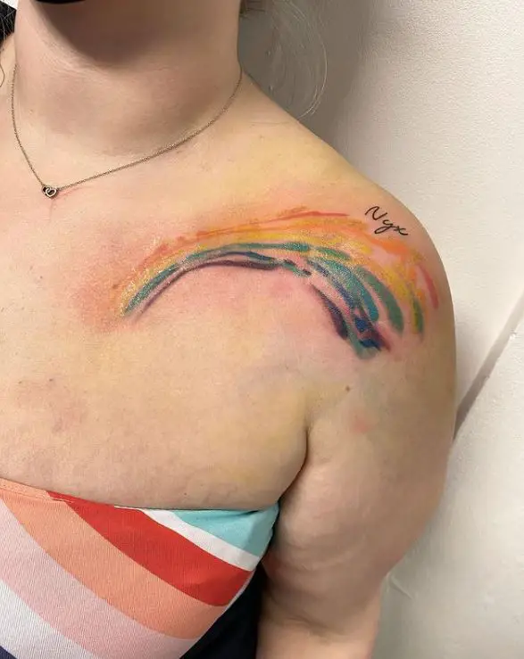 Rainbow shoulder tattoo