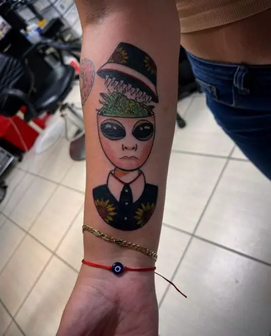 alien arm tattoo
