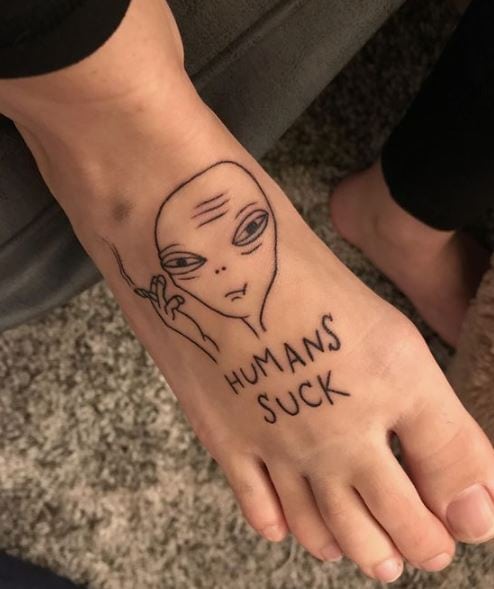 alien tattoo with wording
