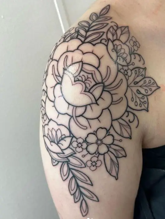 black floral shoulder tattoo