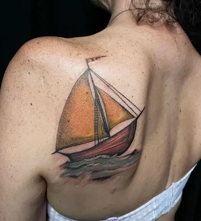 coloured sailboat tattoo