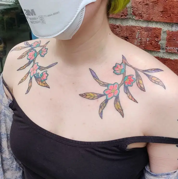 colourful twin shoulder tattoo