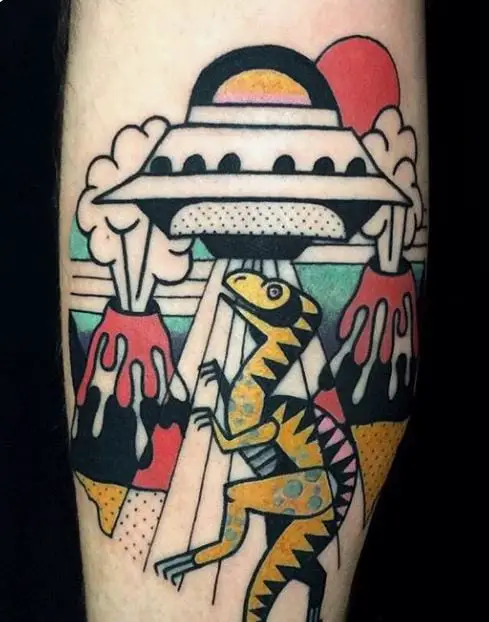 dinosaur and a spaceship tattoo in colour