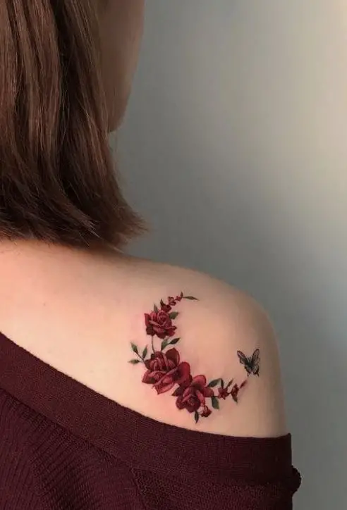 floral half crecent shape tattoo
