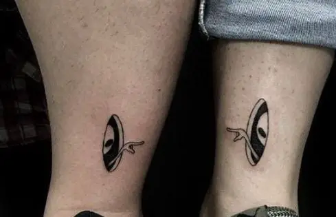 matching sibling alien tattoo