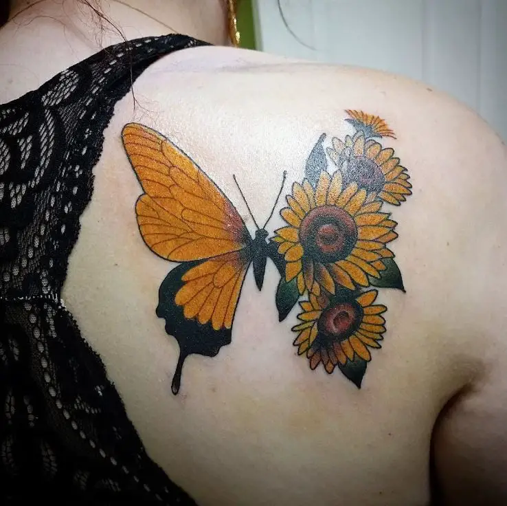 yellow butterfly tattoo with flowers