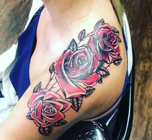 3 roses tattoo with black outline