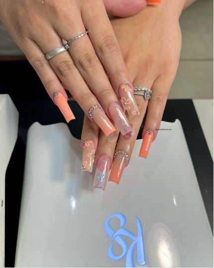 3D Flowers and Tiny Rhinestones On Orange Nails