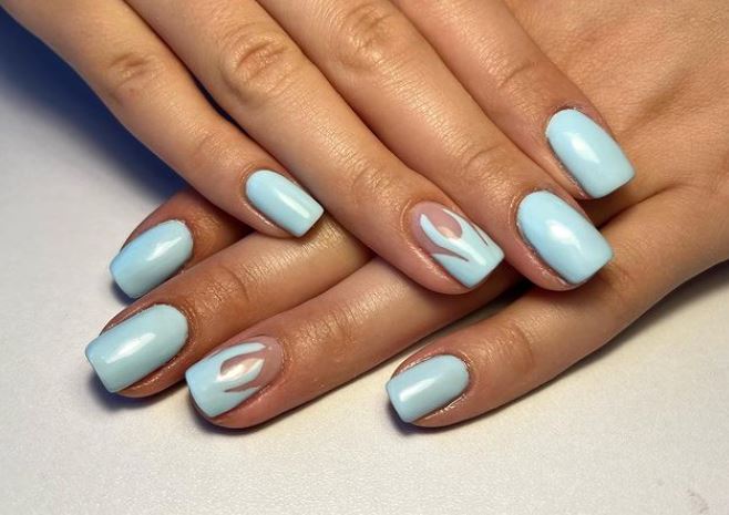 Baby blue acrylic nails with flames