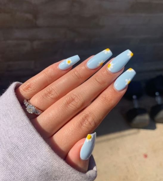  Baby blue acrylic nails with yellow flowers