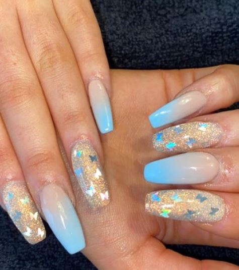 Baby blue nails with holographic glitter