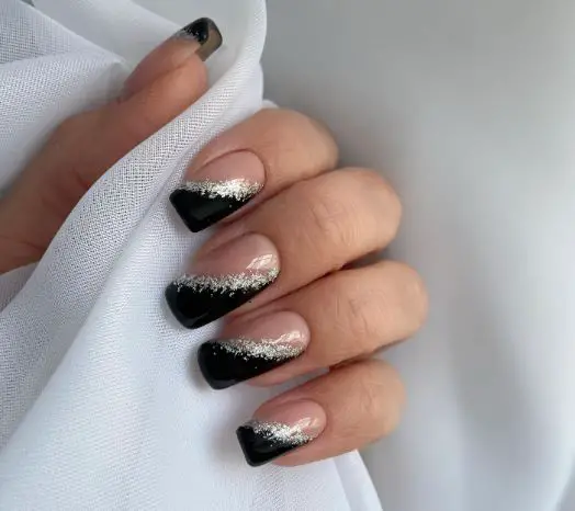 Black Acrylic Nail With Silver Glitter On The Nude Shade
