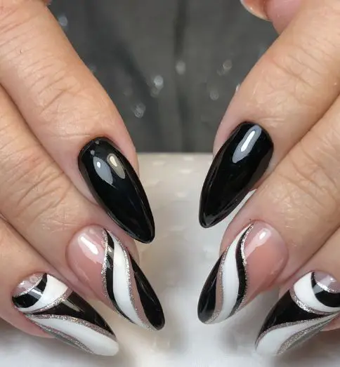 Black Nail Design with White and Silver Lines