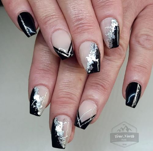 Black Nails with Bold Accent Silver Glitter