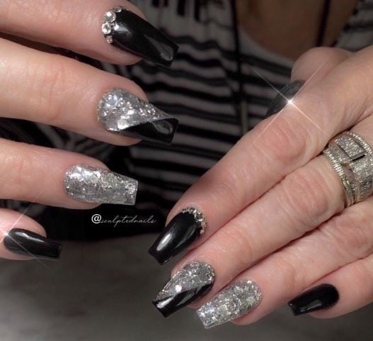 Black Polished Nail with Sparkling Silver Glitter