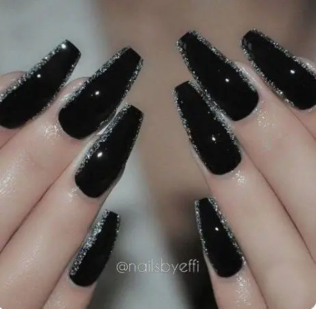 Black chrome nails with glitter on the sides