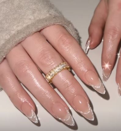 Clean silver nail design with glitter tips