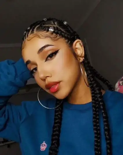 Cornrows Hairstyle With Well-Laid Edges and Silver Accessories
