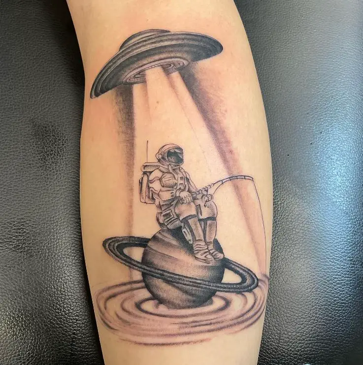 Fishing Astro Getting Abducted tattoo