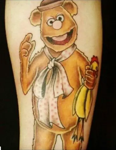 tattoo of Fozzy bear holding a rubber chicken