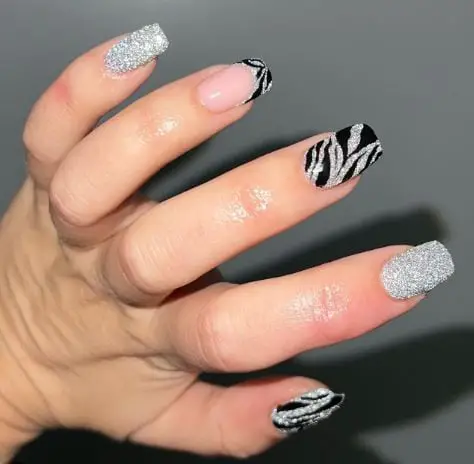 Gel manicure with silver tier nail art