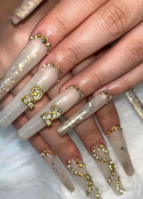 Gold Graduation Nails