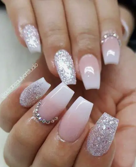 Light pink with silver glitter Nails