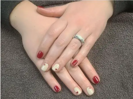 red and white heart nails