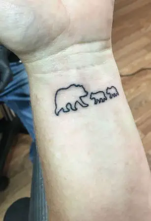 Mama bear tattoo with two cubs