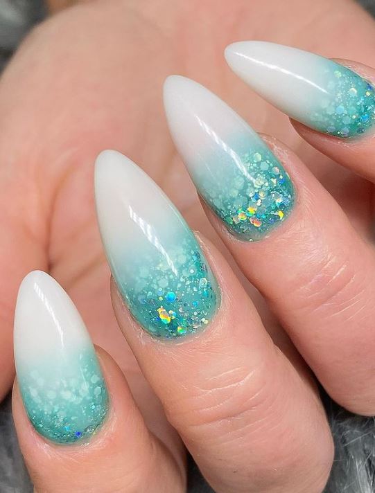 Milky White Turquoise Stiletto Nails