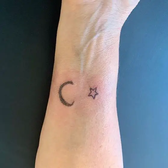 Moon and Star Tattoo on the hand