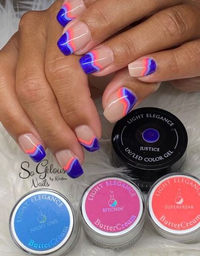 Navy Blue Light Blue and Orange Nail Design