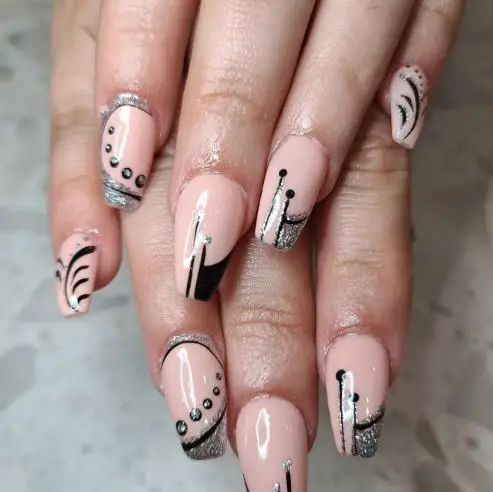 Nude Manicure with Black and Silver Nails