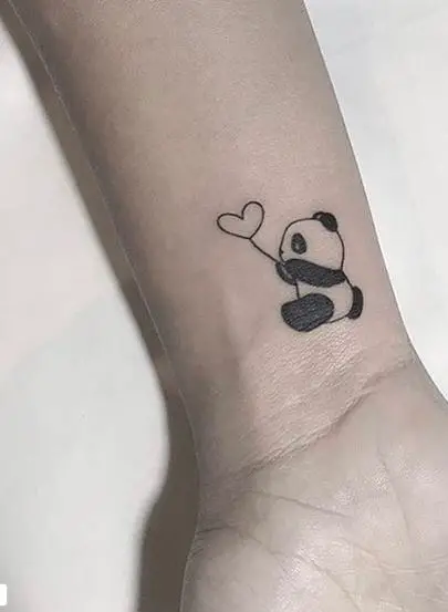 Panda Holding A Heart Balloon Tattoo