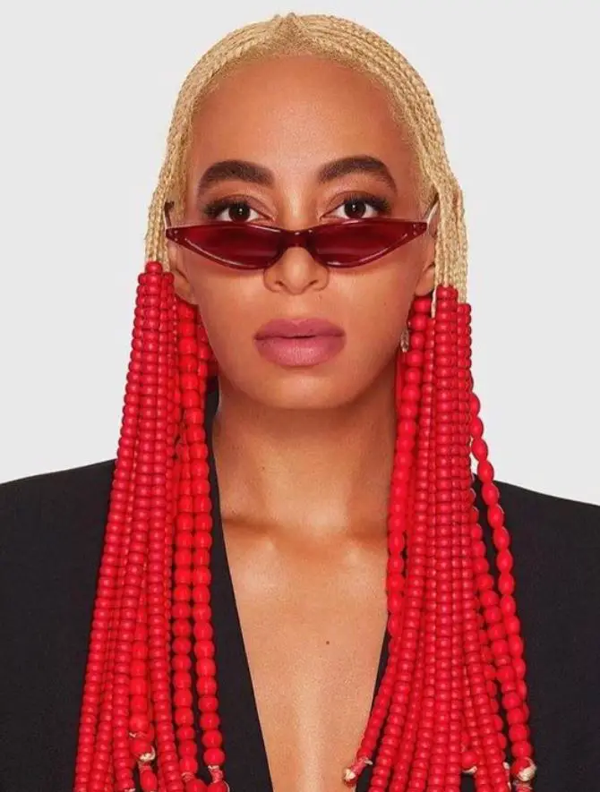 Platinum Blonde Fulani Braids With Red Beads
