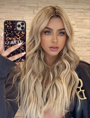 Selfie Girl With Blonde Hair With Brown Roots