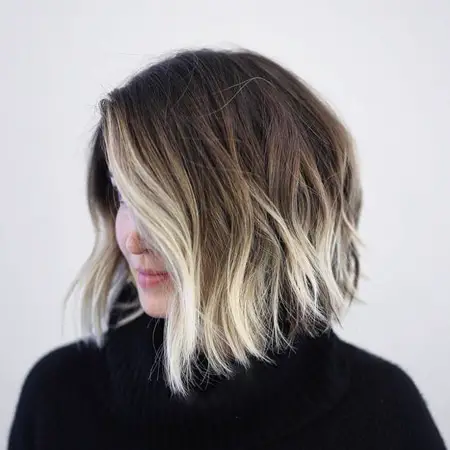 Short Curly Brown Hair with Blonde Highlights