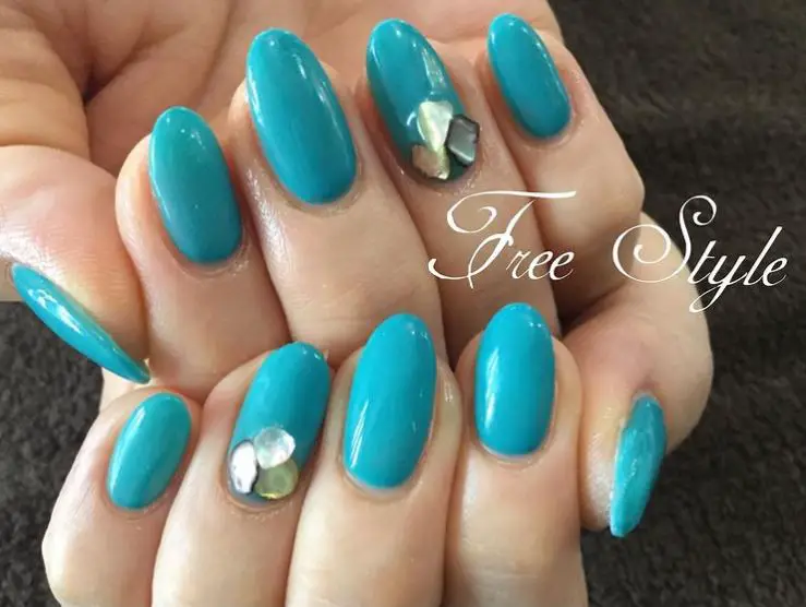 Stunning Turquoise Nails with Gemstones