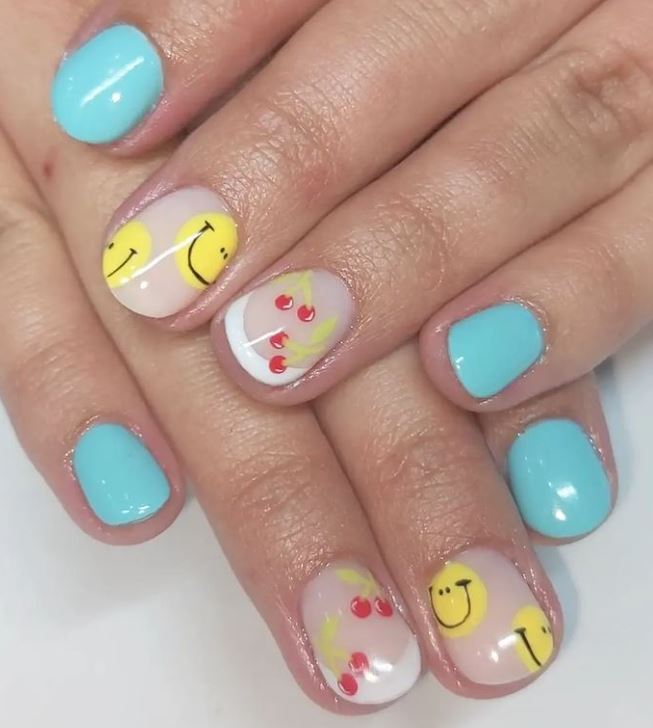 Turquoise Nails with Smiley Faces and Cherry Designs