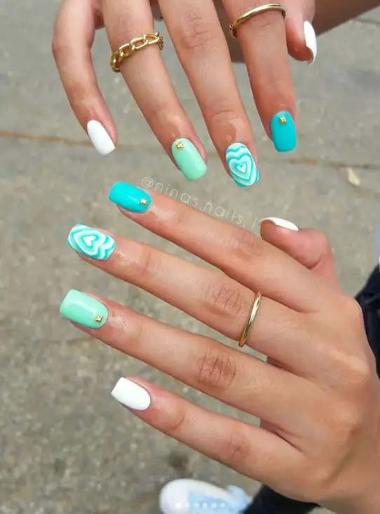 Turquoise Nails with Heart Design
