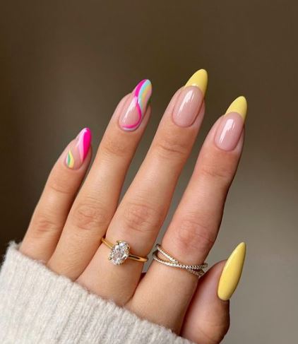 Yellow French Tips and Blue and Pink Wavey Nails