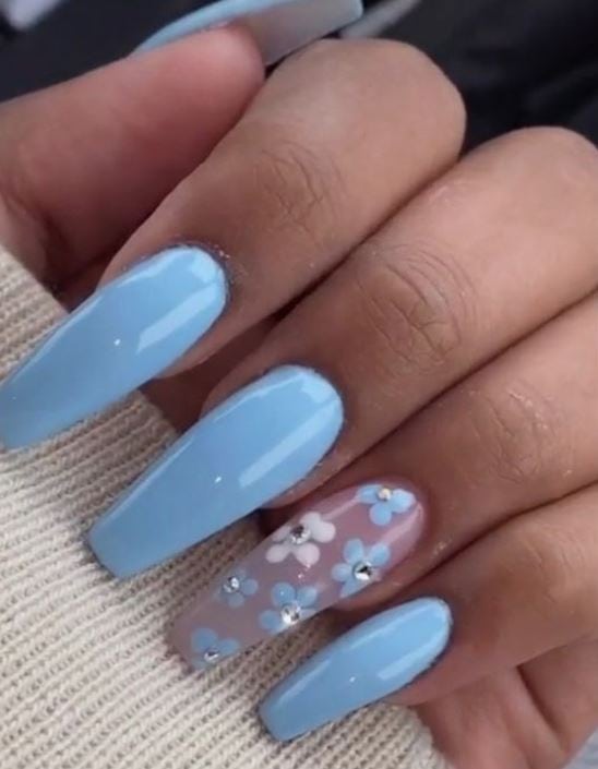 baby blue nails with floral accent