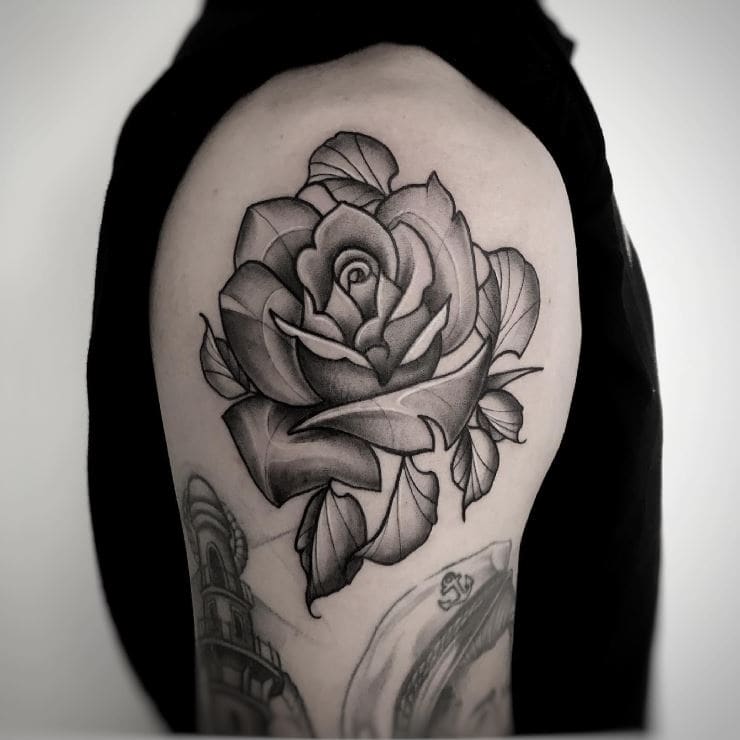 black and grey single rose tattoo