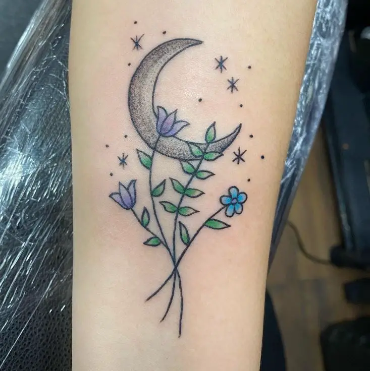 black moon and flowers tattoo