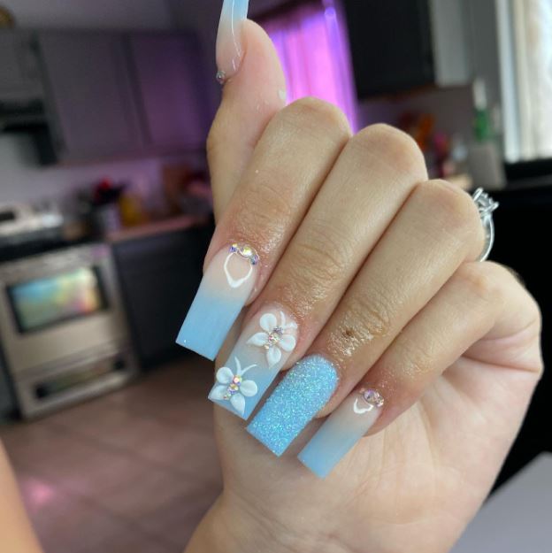 blue ombre acrylic nails with butterflies