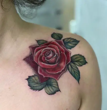 coloured rose tattoo with leaves