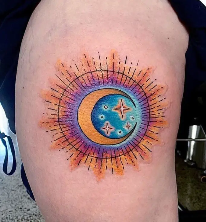 colourful and intricate moon and stars tattoo