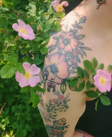 colourful wild rose tattoo