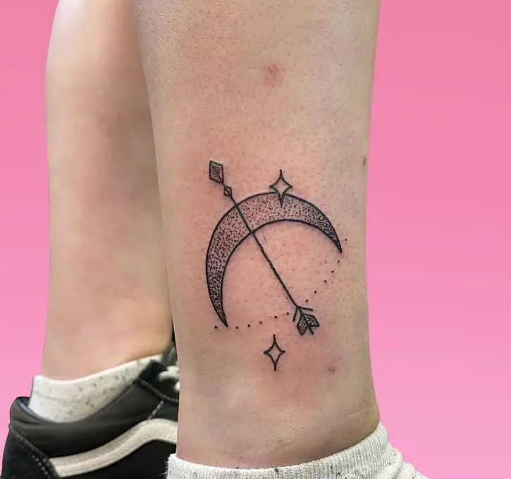 complex moon and stars tattoo